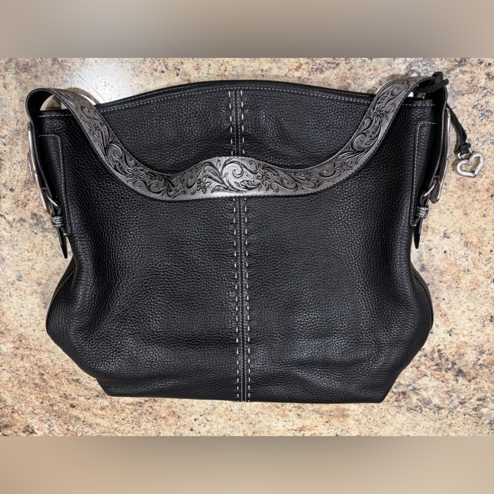 Brighton Black Concho Leather Womenโs Shoulder Bag with Decorative Silver Strap